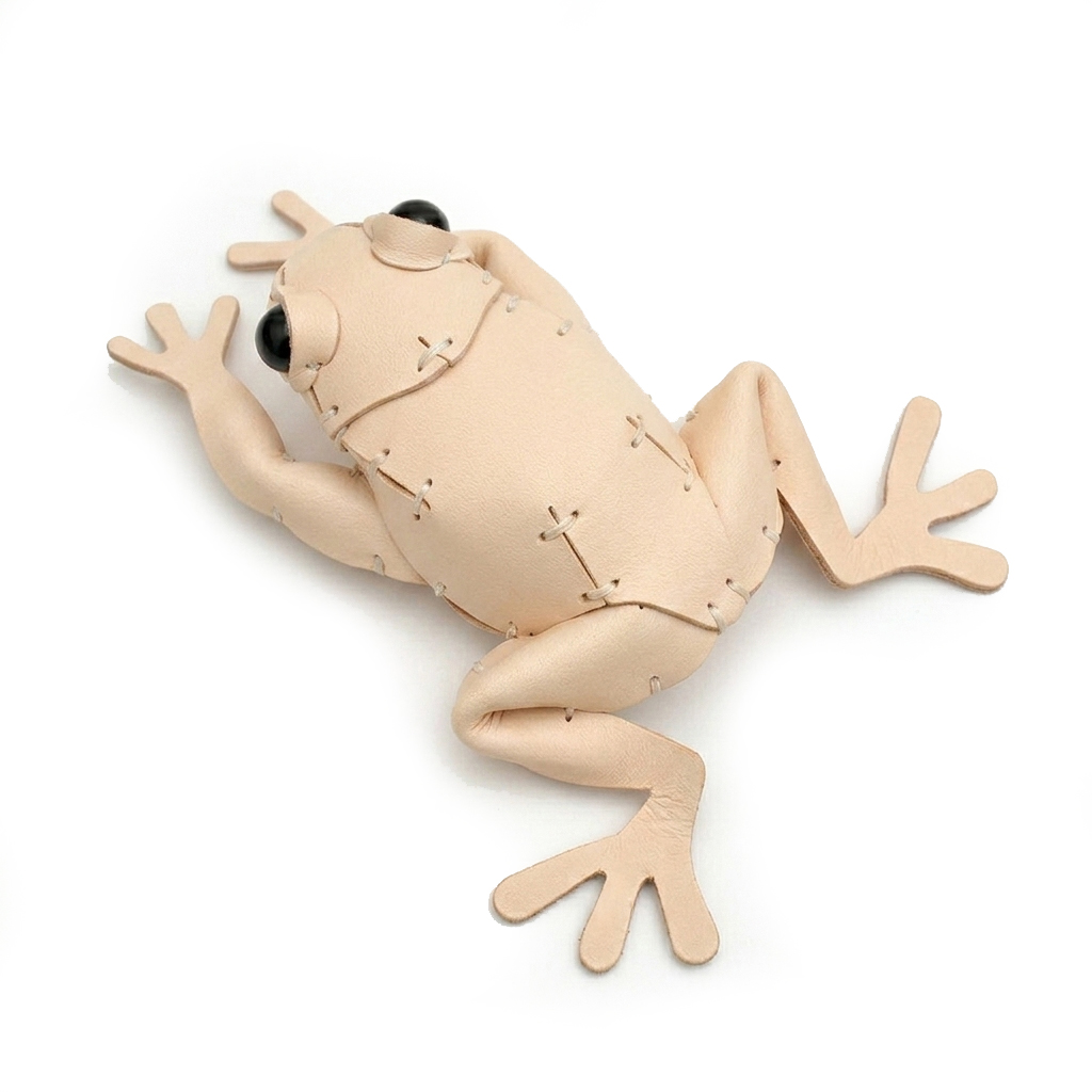 The Natural colourway — a single leather frog in veg-tanned leather, seen from above.