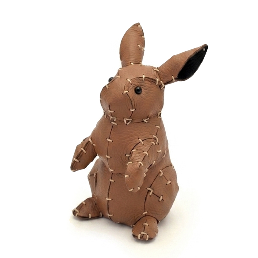 The Brown colourway — a single standing leather rabbit.
