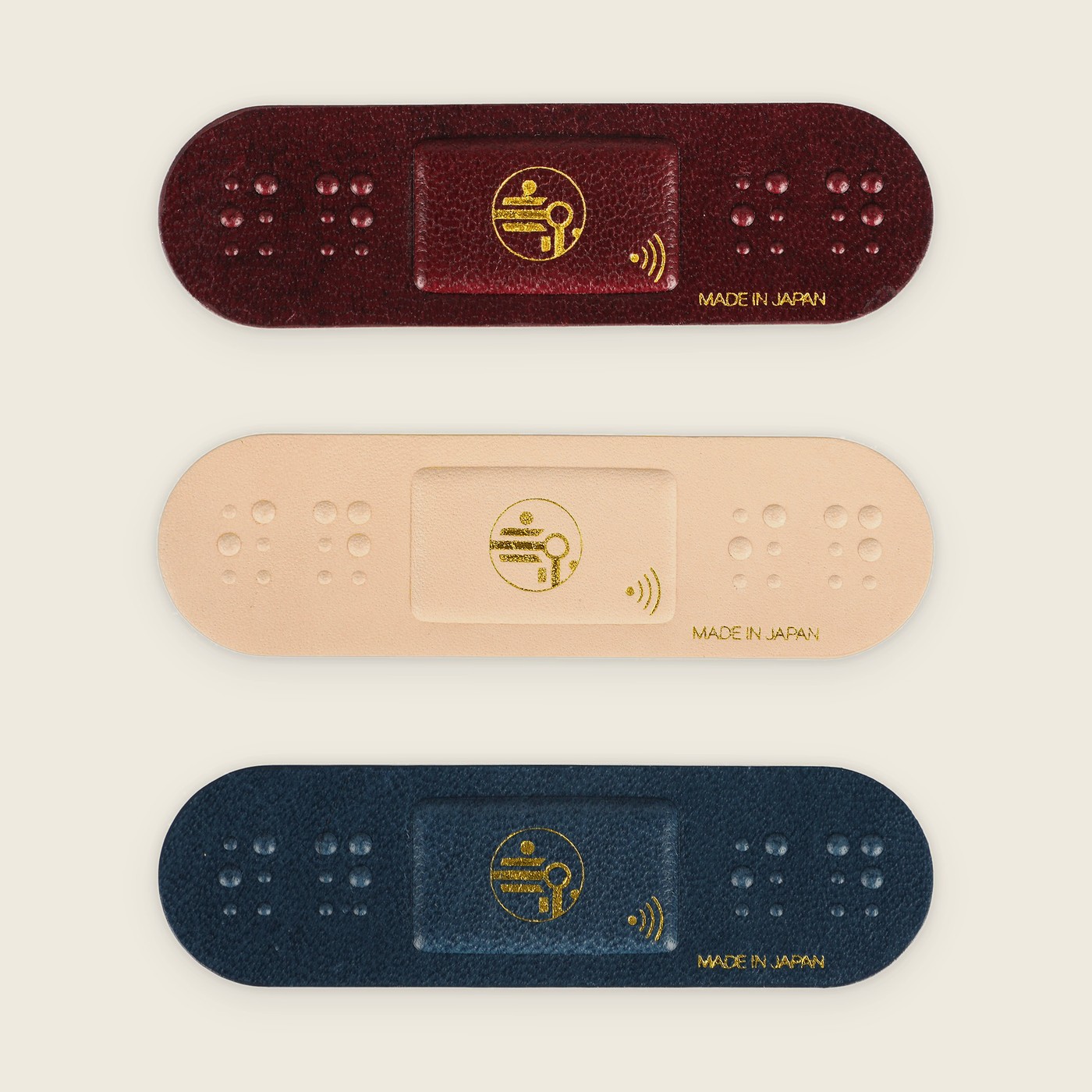 A Grain Patch set of three — Wine, Natural, and Navy — surrounded by words