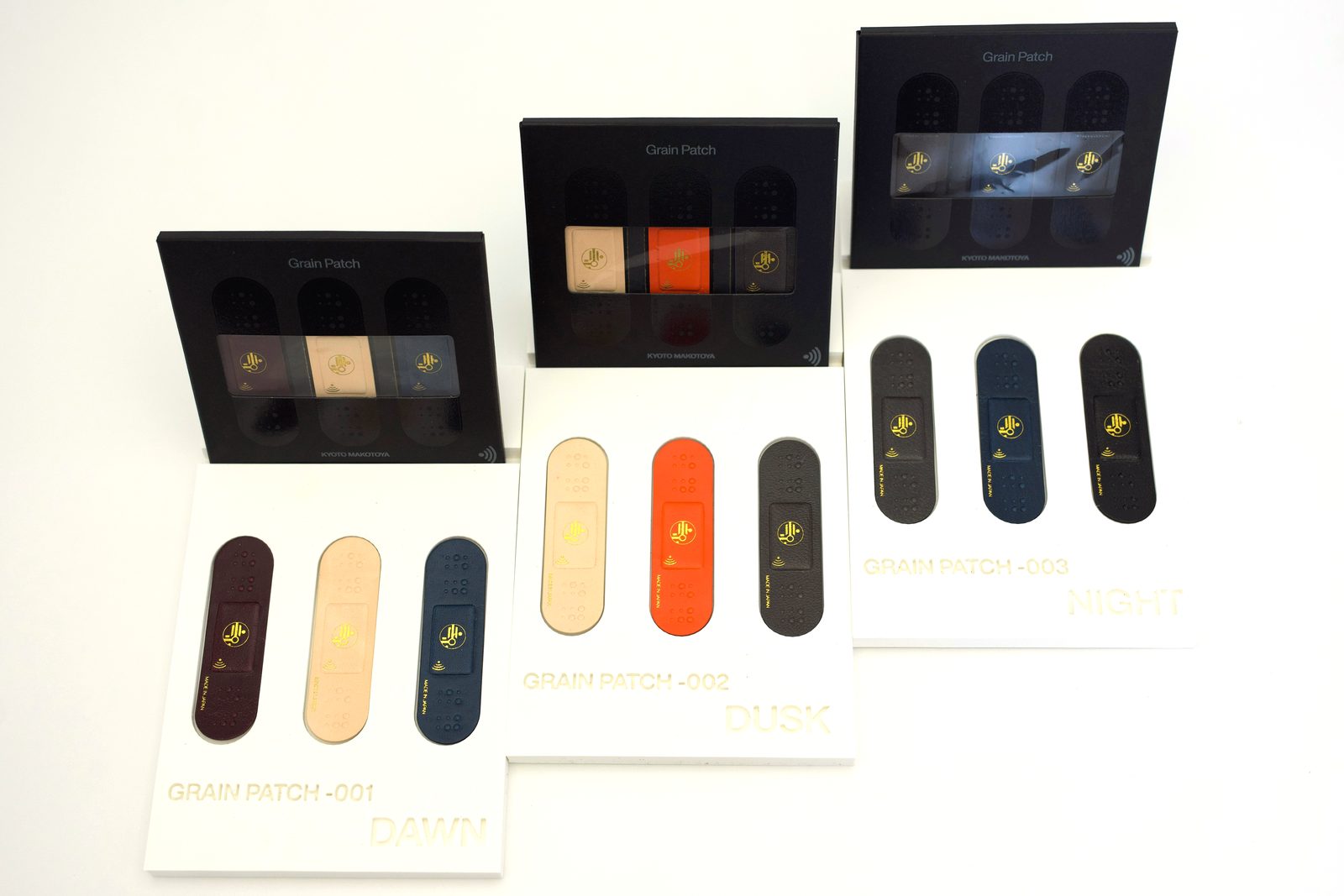 The full Grain Patch lineup — Dawn, Dusk and Night, each a boxed set of three, made in Kyoto, Japan